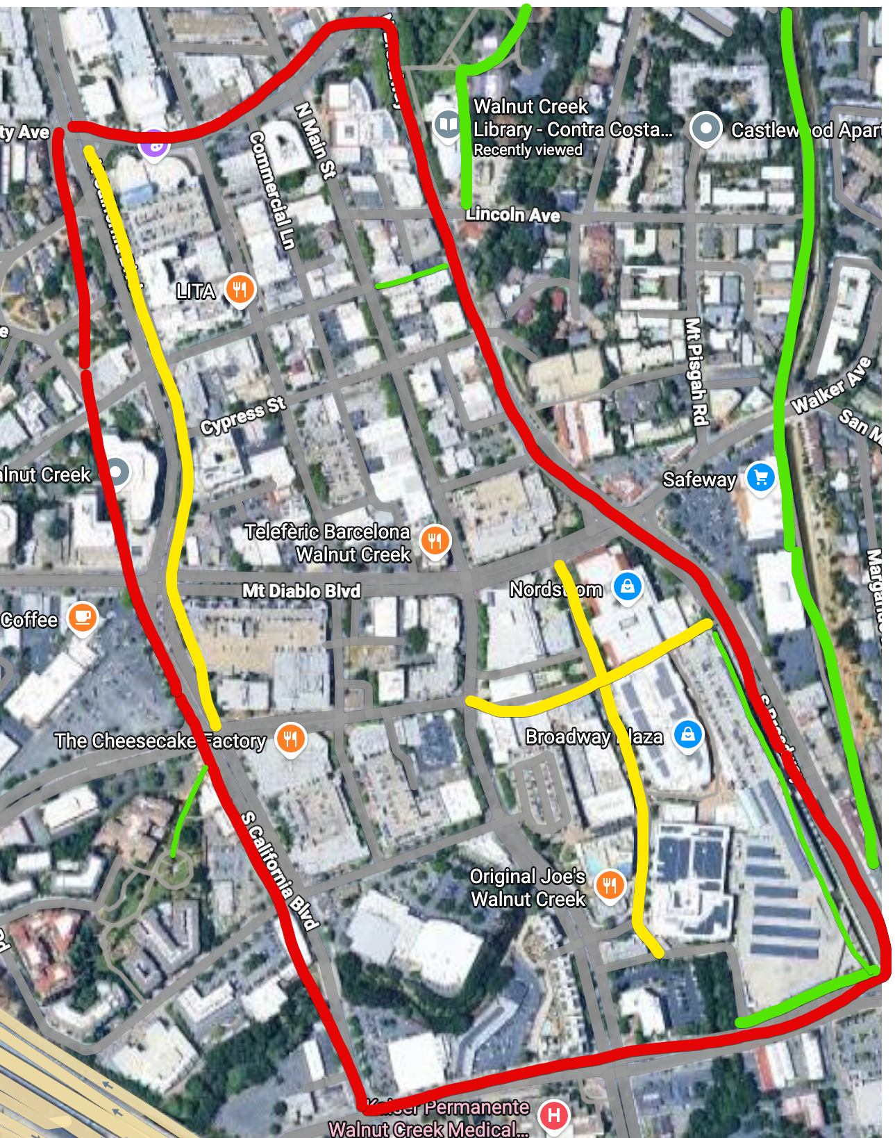 Satellite map of downtown Walnut Creek with colored route overlays: a red perimeter loop, a yellow north-south route along the west edge, a yellow east-west route along Mt. Diablo Boulevard and Broadway, and green connector segments on the east side